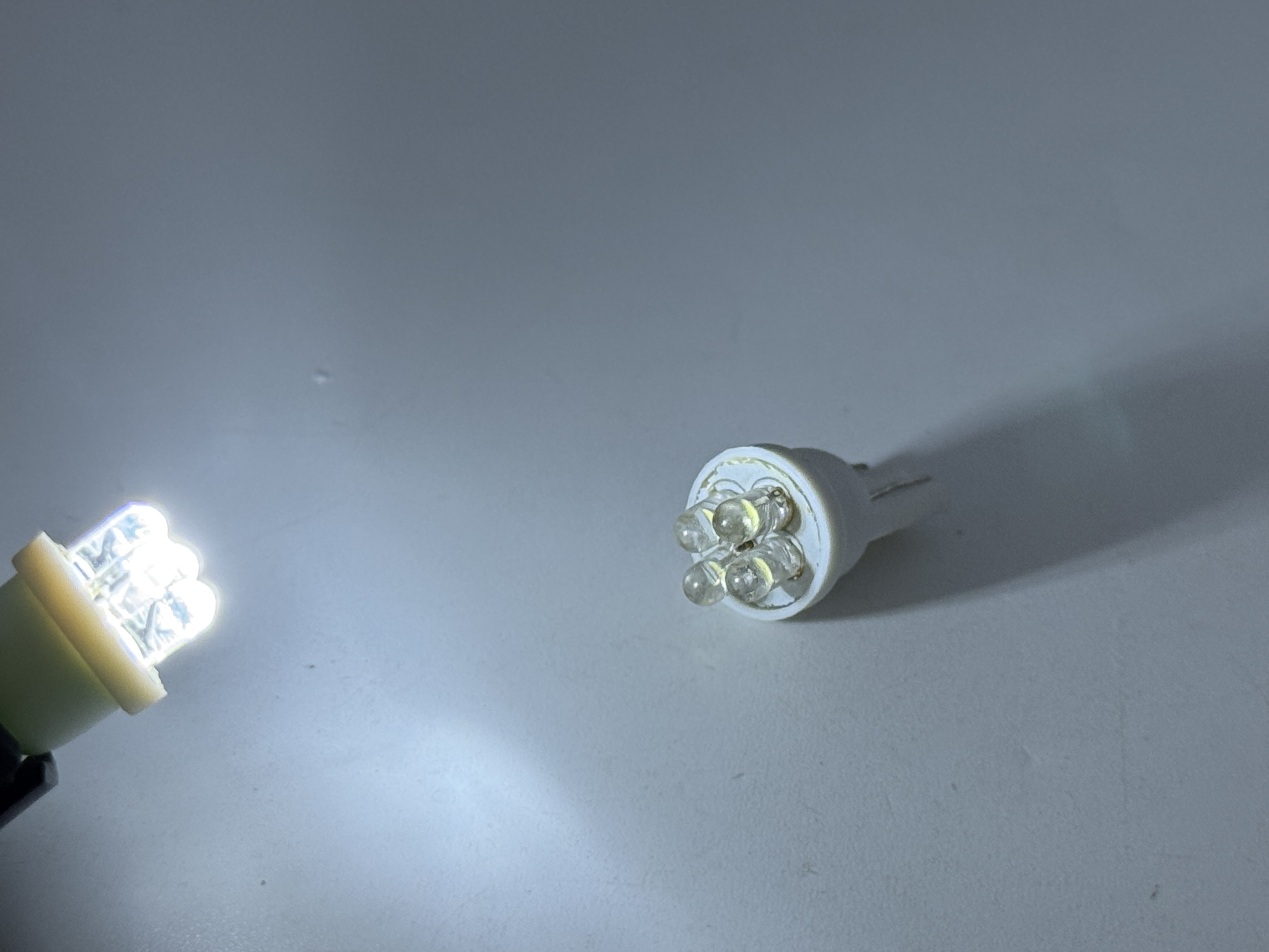 Rebaydo 2pcs 4 LED T10 Wedge Bulb12VDC