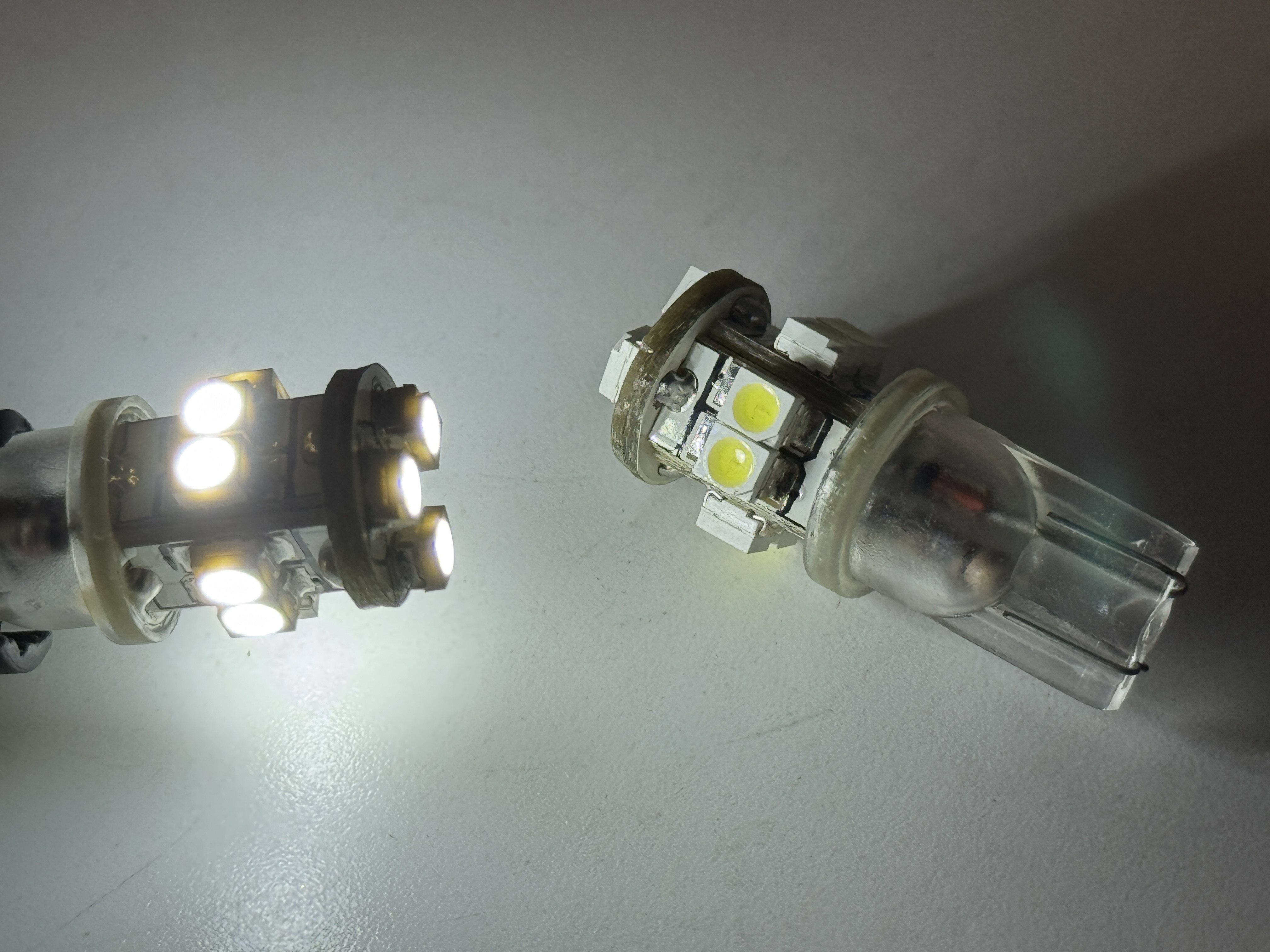 Rebaydo 2pcs T10 Wedge 11 SMD Ultra Bright Bulb 12VDC